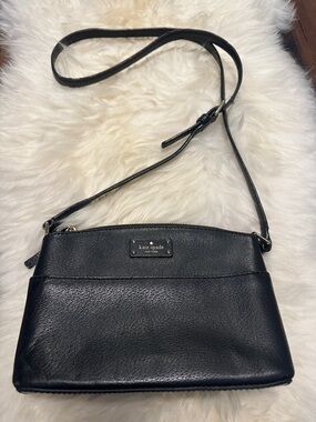Kate Spade genuine leather black bag( shown in the picture)